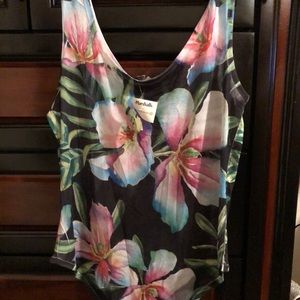 Beautiful sheer floral bodysuit.
